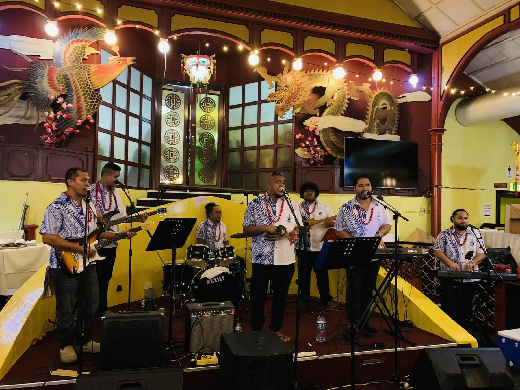 Sons of UK performing live at a community event